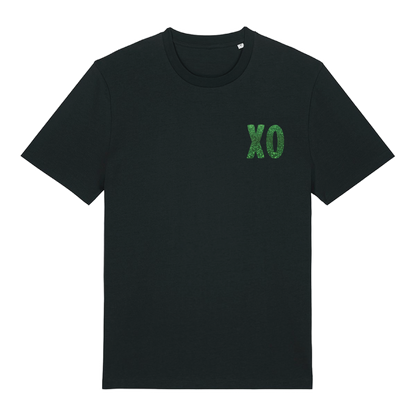 Black t-shirt with XO logo printed in glittery green on chest and patterned print with green glitter overlay on back, bold graphic design